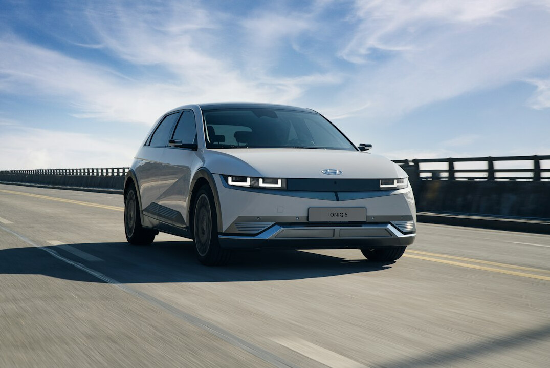 tesla electric car on highway